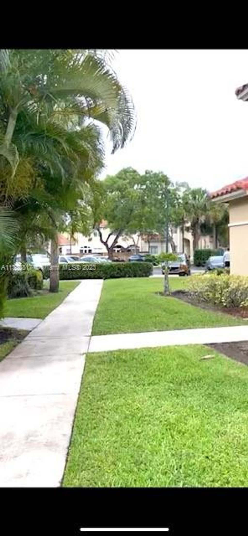 Photo of 561 N Racquet Club Rd #22, Weston, FL 33326 (MLS # A11380817)