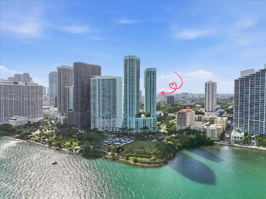 This condo, this community, it's exactly what you've been dreaming of. Welcome Home to Quantum on the Bay #1518, a spacious corner 2-bedroom, 2.5-bath condo in the heart of Edgewater Miami. This layout delivers the privacy you want: ensuite bathrooms & walk-in closets in each room, plus a guest bathroom and dedicated laundry closet tucked away to keep the living spaces quiet & uncluttered. Natural light fills the home throughout the day, and evenings bring gorgeous sunset skies and a calm, elevated feel. Entertain or unwind on the nearly 300 sq ft terrace and create your own private sanctuary above the city.

Pet lovers will love the lifestyle, with Margaret Pace Park just across the street featuring open green space, a dedicated dog area, shaded paths, and the bayfront promenade. Nearby paddleboard and kayak rentals make it easy to enjoy Biscayne Bay and the waterfront scenery.

Quantum offers a “close to everything” lifestyle without the constant noise of the Miami hustle. Enjoy quick access to Midtown, the Design District, Wynwood, Downtown, Miami Beach, I-95, Miami International Airport, and top cultural destinations including the Adrienne Arsht Center, Pérez Art Museum Miami (PAMM), Frost Science Museum, and more.

Quantum on the Bay is a full-service, amenity-rich building featuring 24/7 concierge and security, valet, two pools, a two-story fitness center, sauna, club/lounge spaces, and a theater room, plus convenient ground-level retails and foodie spots nearby.