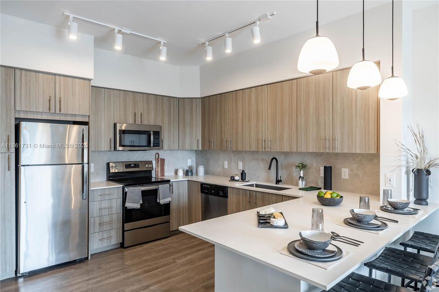 NO LAST MONTH for Qualified Tenants! VACATION-INSPIRED COMMUNITY with HOME/WORK RESORT-STYLE Living. Views of HARD ROCK STADIUM & quick access to I-95 & TURNPIKE. CO-WORKING LOUNGE with COMMUNITY WI-FI. Amenities: FITNESS CENTER, PALM-LINED POOL with CABANAS, ALFRESCO DINING, LAVAZZA COFFEE BAR, TULUM-STYLE CLUBHOUSE, PUTTING GREEN, OFF-LEASH DOG PARK & TURF-LINED PUPPY PORCHES. Each Unit Features: IMPACT-RESISTANT WINDOWS & DOORS, IN-HOME WASHER/DRYER, HARDWOOD-STYLE FLOORING, SMART THERMOSTATS, HIGH-SPEED INTERNET/WI-FI, & ELECTRIC STAINLESS-STEEL APPLIANCES. DISCLAIMER: Images for reference only. Landlord Verifies Income and Runs Credit. Information, pricing, fees, and details are subject to change without notice and must be verified directly with Landlord. *APPOINTMENT ONLY NO WALK-INS LISTING AGENT AND TENANT AGENT MUST ACCOMPANY*