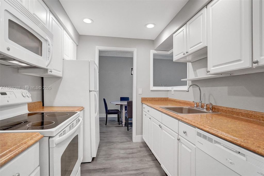 Photo of 400 N Riverside Dr #214, Pompano Beach, FL 33062 (MLS # A11988388)