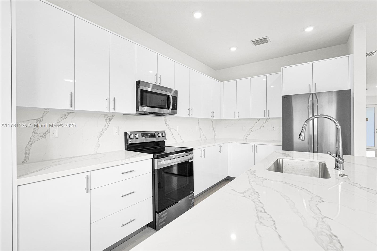 Discover exceptional value with Chloe's Estates, where spacious twin homes offer 2,500 sq. ft. of living space. Choose from two unique models designed for comfort and privacy, featuring high-end finishes like stainless steel appliances, quartz countertops, and 32x32 rectified tiles. Enjoy high ceilings, waterproof vinyl flooring on the second floor, and large backyards big enough for a pool. Conveniently located near shopping, the Florida Turnpike, and US1, these homes provide the perfect blend of space, style, and accessibility—setting a new standard for quality living in South Florida.