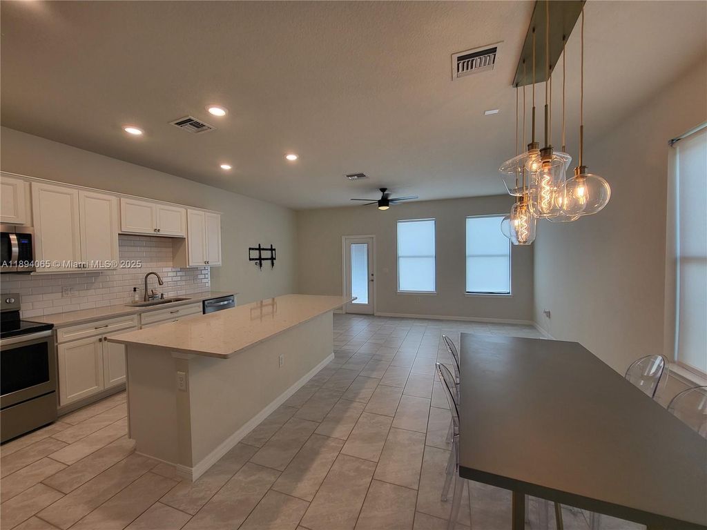 Photo of 2820 Troubadour St, Palm Springs, FL 33406 (MLS # A11894065)