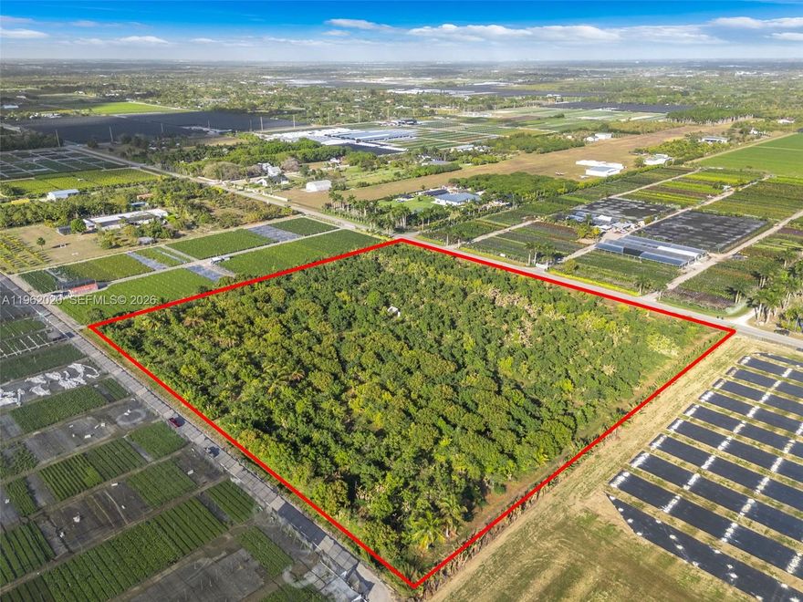 Prime 10-acre Redland agricultural opportunity (Folios: 30-6815-000-0143 & 30-6815-000-0144). Both parcels must be sold together. Located approx. 1 mile west of Krome Ave with excellent paved road access near major thoroughfares. Situated in one of Redland’s most desirable agricultural pockets known for deep, nutrient-rich soil, open skies and a thriving farming culture. Productive avocado grove featuring various avocado varieties along with banana, papaya, and mango trees. Property includes sprinkler irrigation, two wells and a Detroit diesel pump. Zoned AU Agricultural with potential for one estate home per 5 acres (possible two estate homes). Ideal for nursery operations, tropical fruit production, agribusiness or a private agricultural estate.