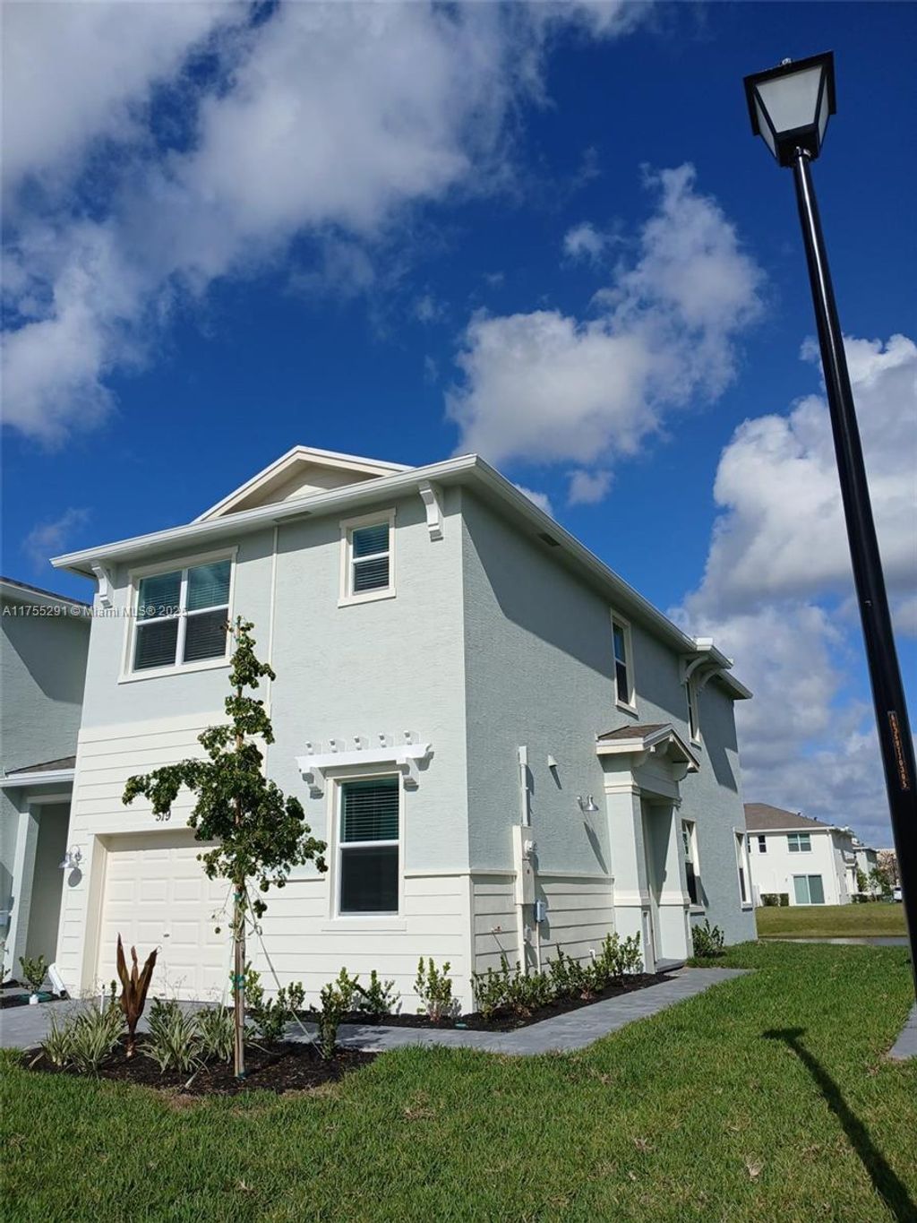 Photo of 519 SE Rivergrass St #519, Port Saint Lucie, FL 34984 (MLS # A11755291)