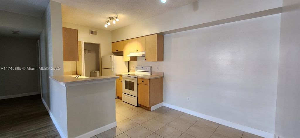 Photo of 10306 S Fox Trail Rd S #906, Royal Palm Beach, FL 33411 (MLS # A11745865)