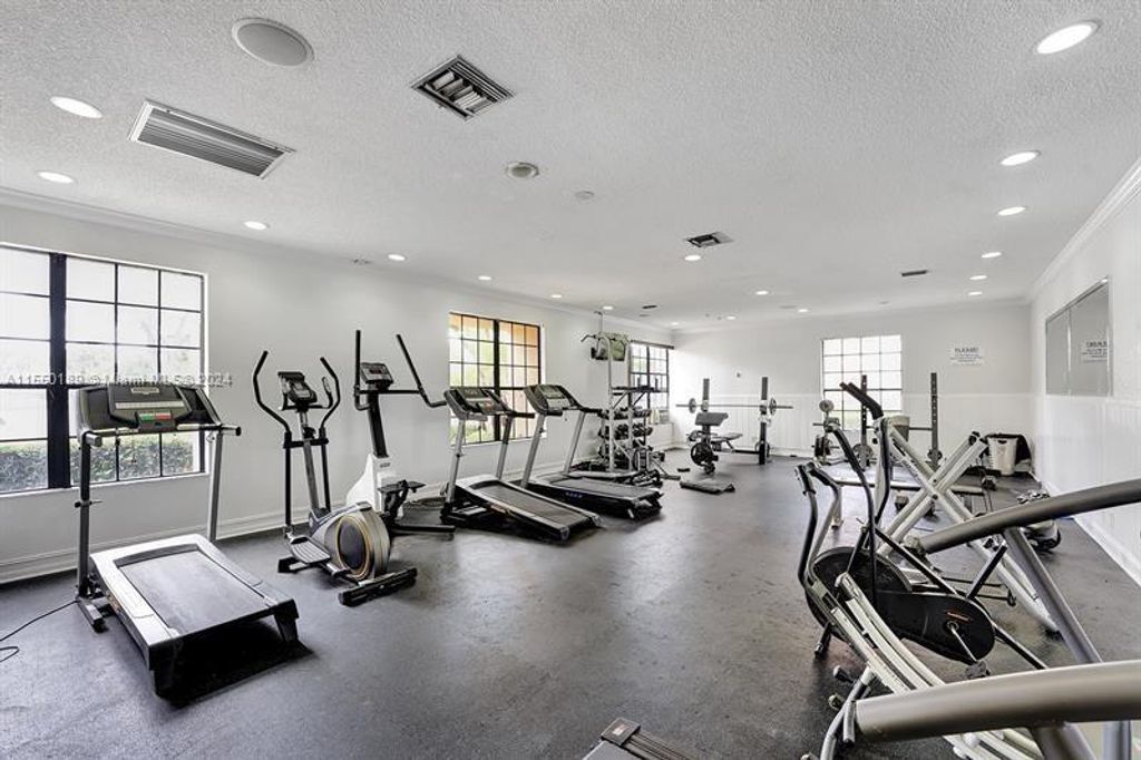 Photo of 5721 Riverside Dr #302B5, Coral Springs, FL 33067 (MLS # A11550189)
