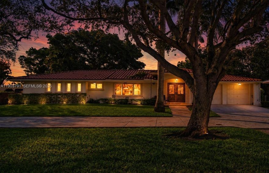 New to market at $2,770,000. Spacious 4-bedroom, 3.5-bath home on a quiet, tree-lined street in Miami Shores. High ceilings and a dramatic oversized living area offer open flow and defined spaces for relaxing or entertaining. The expansive chef’s kitchen overlooks the pool and backyard with exceptional storage, generous prep space, casual seating, gas range. The primary suite features two walk-in closets and a spa-style bath with Italian stone walk-in shower with built-in seating, double vanities, and private water closet. Seven walk-in closets throughout, six with Elfa systems, provide abundant storage. Enjoy a heated salt-chlorinated pool, large covered outdoor entertaining area, spacious laundry room with cabinetry. All impact windows and doors, updated plumbing and electrical, natural gas, and two gas tankless water heaters, three Trane AC systems, full-house Generac generator, security with cameras and video entry. Attached 1.5-car garage, and ample double driveway parking.  Images may be virtually staged and/or digitally enhanced (furniture, colors, fixtures, landscaping) for illustrative purposes only.