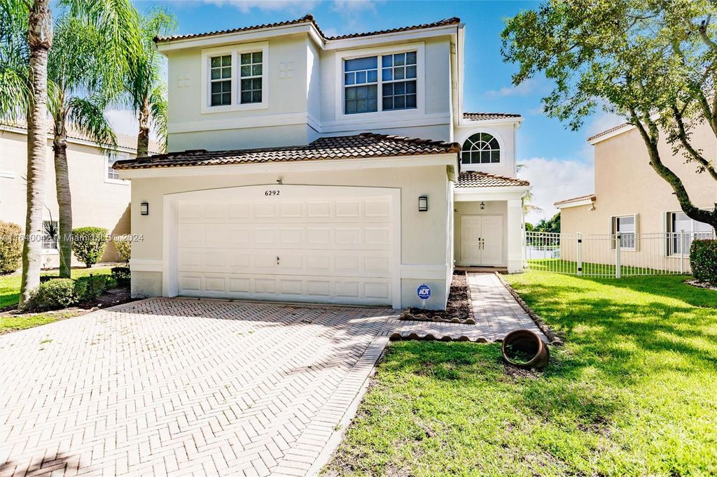 Photo of 6292 NW 40th Ave, Coconut Creek, FL 33073 (MLS # A11640042)