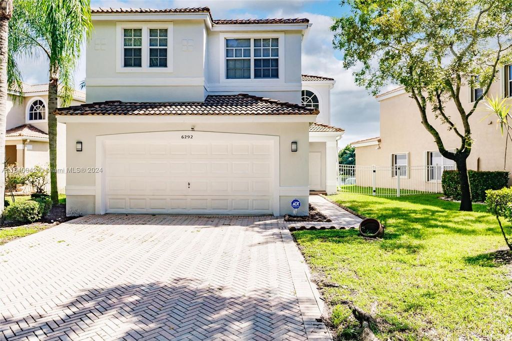 Photo of 6292 NW 40th Ave, Coconut Creek, FL 33073 (MLS # A11640042)