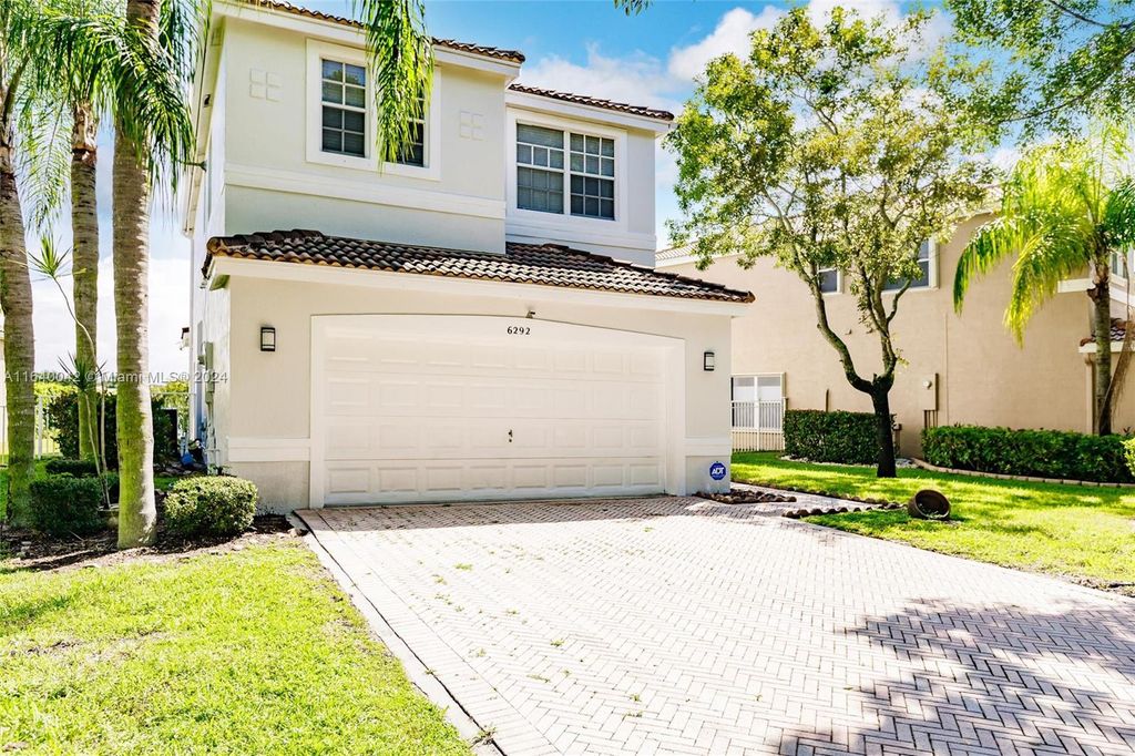 Photo of 6292 NW 40th Ave, Coconut Creek, FL 33073 (MLS # A11640042)