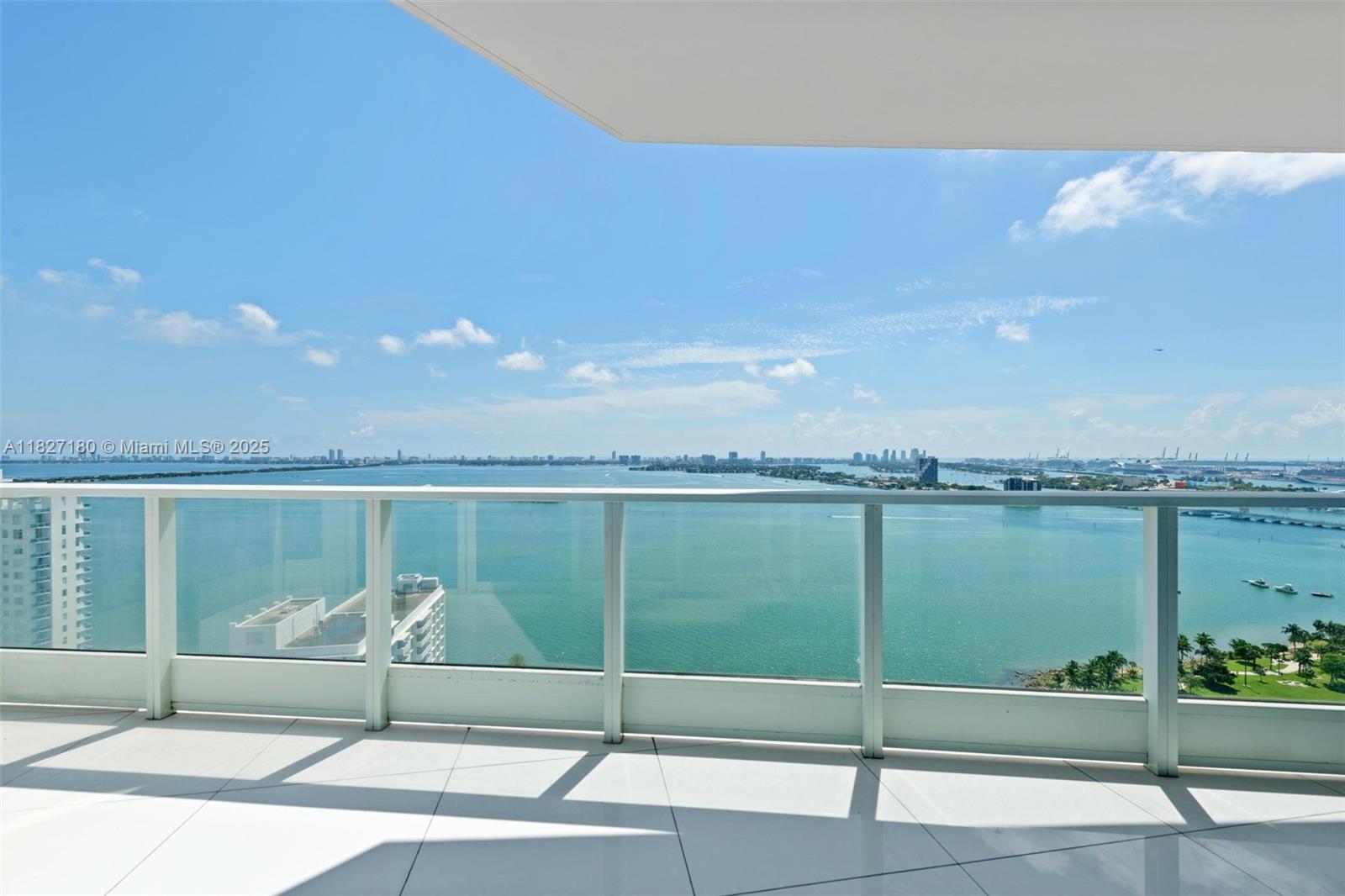 Stunning views of Biscayne Bay and Miami Beach from the best line at Paramount Bay. This beautiful corner residence features 10ft floor to ceiling glass windows. Spacious 2 bedroom 2 ½ large bathrooms, big balcony with amazing sunrise view. White glass porcelain tiles thought out, top of line appliances, California closets, rain showers, designer light fixtures, blackout blinds. Full-service building with sunrise/sunset pools, Cabanas, yoga studio, kids room, business center and Party room. Easy to show! Call today for a private showing.