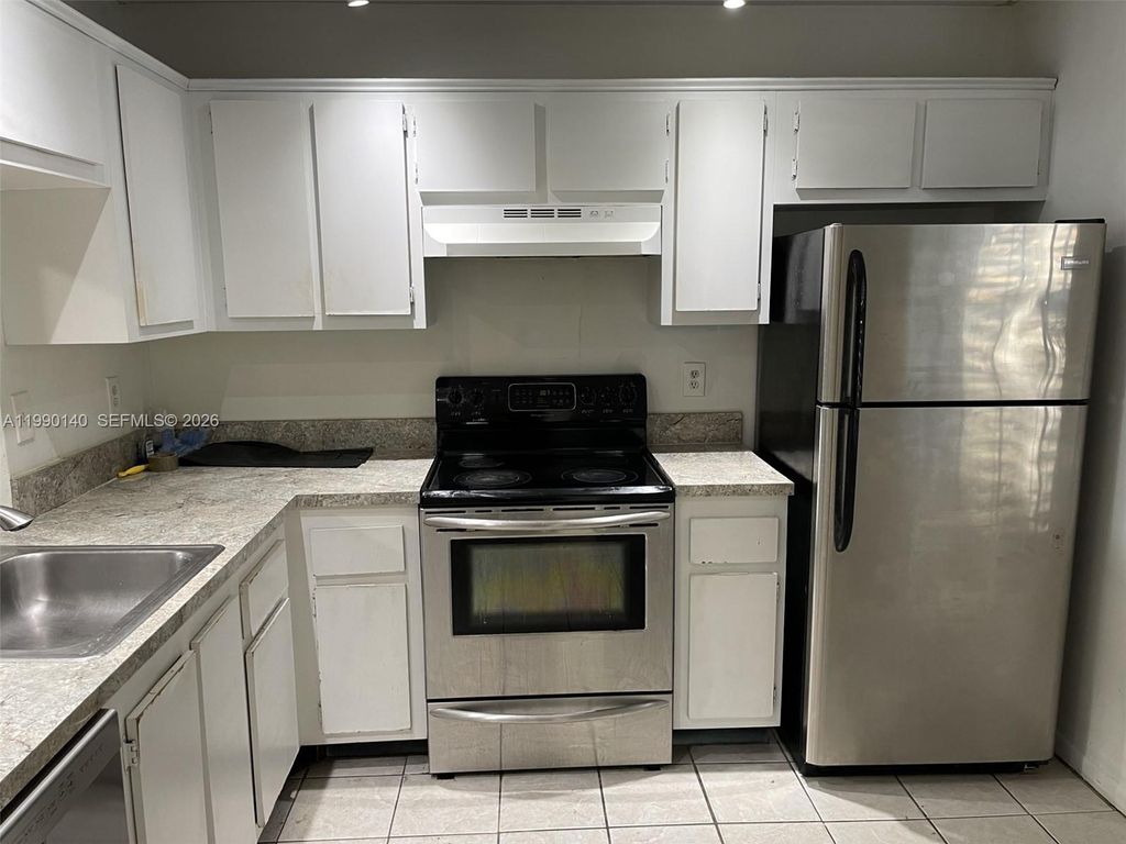 Photo of 10508 NW 6th St #10508, Pembroke Pines, FL 33026 (MLS # A11990140)