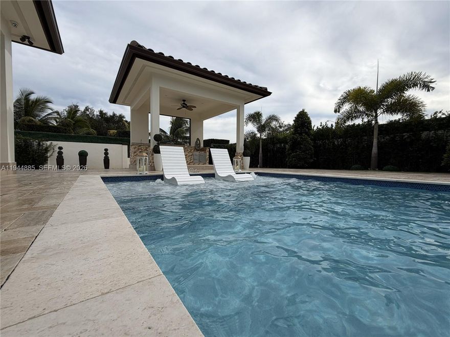 This beautifully crafted custom-built home offers modern design, quality upgrades, and an ideal location close to major highways, shopping centers, and everyday conveniences. Thoughtfully designed with bright, open living spaces, the home features high-end finishes and meticulous attention to detail throughout.

The modern kitchen is equipped with upgraded cabinetry, quality countertops, and contemporary appliances, seamlessly connecting to the main living areas—ideal for both daily living and entertaining. Notable features include a FPL charger for electric vehicles and a full security camera system for added peace of mind.
Every aspect of the home has been upgraded, making it truly move-in ready. Spacious bedrooms and updated bathrooms provide comfort and style, while the well-maintained exterior offers space to relax or entertain.
A rare opportunity to own a fully upgraded, custom-built home in a highly convenient location that perfectly blends comfort, style, and accessibility.