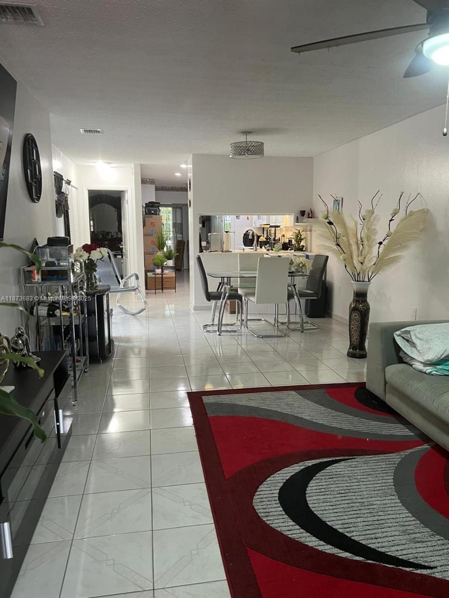 This charming one-story townhouse features 3 bedrooms and 1 bathroom, tastefully renovated with impact windows and doors for added security and energy efficiency. Conveniently located near shopping plazas, schools, hospitals, and major expressways. All measurements are approximate.
Please note: The townhouse includes an attached studio that will be rented separately.