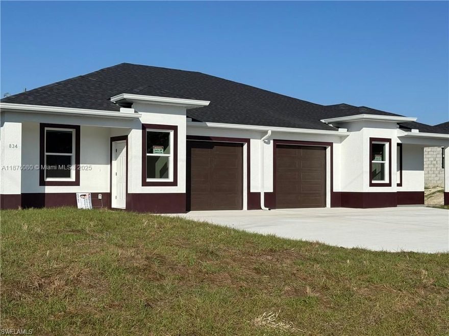 This newly constructed duplex offers modern living in Lehigh Acres.Each unit is identical and offers a spacious layout with 3 beds and 2 baths. The properties feature a one-car garage and a generously sized driveway, offering plenty of parking space for residents and guests alike. The front of the units is enhanced with extra windows that allow ample natural lighting light to flood the living spaces, along with impact resistant windows and doors for added durability and security. The kitchens are designed with style and functionality in mind, featuring beautiful granite countertops, high-end stainless-steel appliances, and sleek white wooden cabinetry.The central kitchen island adds both convenience and elegance, while the tile flooring completes the stylish look.