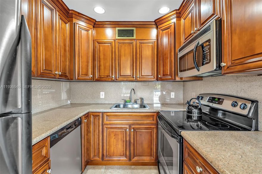 Fantastic new opportunity, Updated 2 bed, 1 and 1/2 bath Condo. This home has been maintained and is extremely well taken care of. You will enjoy this location with all day water views. Easy Parking and spots for your guests. Beautiful wooden Cabinetry and gorgeous granite counter tops compliment the fully tiled floors. The authentic Florida room will captivate your relaxation, or head over to the 5 Star World Class Clubhouse complete with Fitness Centers, Exercise rooms, Hobby rooms including woodworking, Art ceramic, music, dance and many others. You may join one of the 70 variety of clubs offered. This home is priced to sell. You may rent after 1 year of ownership. Do not miss this one. Quality Shopping and Fine Dining all close by, beach is a 10 minute ride!