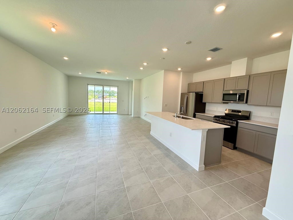 Photo of 1643 Pelican Post Pl #1643, Loxahatchee, FL 33470 (MLS # A12062164)