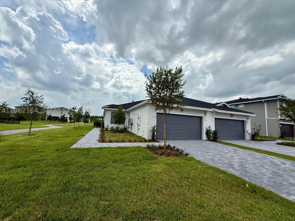 Photo of 1643 Pelican Post Pl #1643, Loxahatchee, FL 33470 (MLS # A12062164)