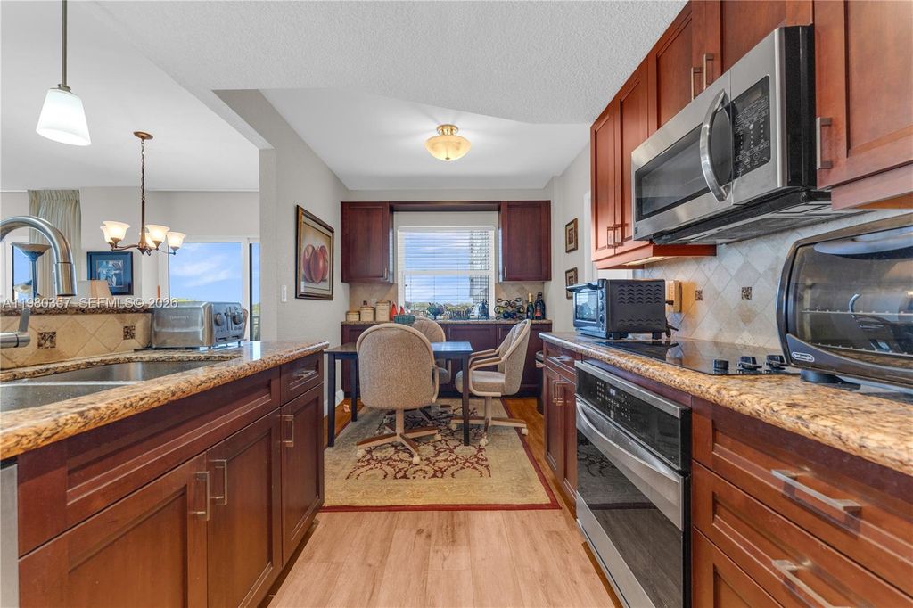 Photo of 3800 Hillcrest Dr #511, Hollywood, FL 33021 (MLS # A11980357)