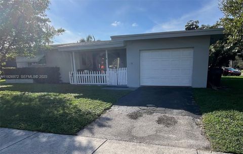 Photo of 91 Fronton Blvd, Dania Beach, FL 33004 (MLS # A11926972)