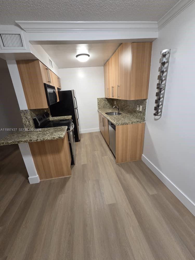 TUDOR MANOR CONDO - Residential