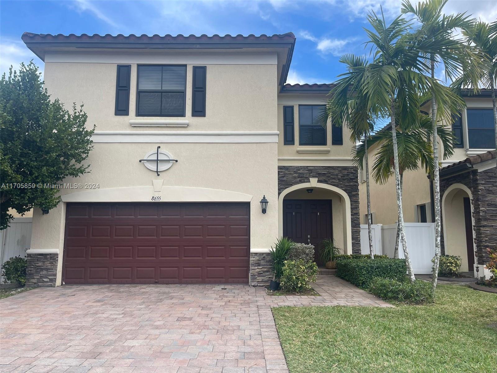 Beautiful 2 story single family, spacious design, 4 bed , 3.5 bath, tiles on the first floor, vinyl throughout the stairs and the second floor, pavers and artificial grass in the backyard, gated community, 24 hours security.