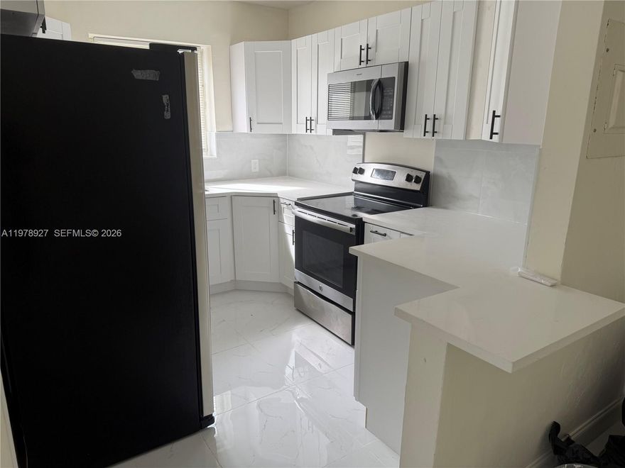 NEWLY RENOVATED**BRAND NEW ROOF(WILL BE COMPLETED THIS WEEK)**HURRICANE SHUTTERS**MOVE IN READY**
This 3 bed, 2 bath home sits in the heart of the city at the intersection of Buena Vista, Wynwood, & Allapatah. Brand new kitchens and baths. A/C is from 2023. Plumbing and electrical recently updated.  Great starter home or investment property. Easy access to major highways for easy commuting, shops, schools and houses of worship. 10 minutes from Miami Airport.  Back room can be rented as an efficiency for additional income. 1 car garage for added storage.***SELLER WILL CONSIDER PAYING SOME CLOSING COSTS***