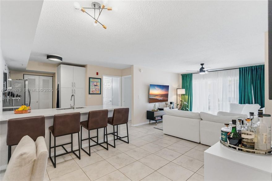 First-floor corner condo in the sought-after in Davie, Fl. This well-designed unit offers extra privacy with only one neighboring unit and features a split-bedroom layout, a bright open living and oversized dining counter area. The open-concept kitchen includes stainless steel appliances newer (2022), Furniture is negotiable. Located within walking distance to campus and shopping, and just minutes from Nova Southeastern University, Broward College, Florida Atlantic University, and top-rated A+ schools. Enjoy easy access to major highways, dining, beaches, and entertainment. Amenities include a pool, fitness center, and tennis courts and dog park. A great opportunity for professors, graduate students, or investors—own instead of renting and way to recover your housing expenses in this highly desirable college area.