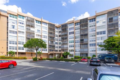 Photo of 1000 Saint Charles Pl #319, Pembroke Pines, FL 33026 (MLS # A11869273)