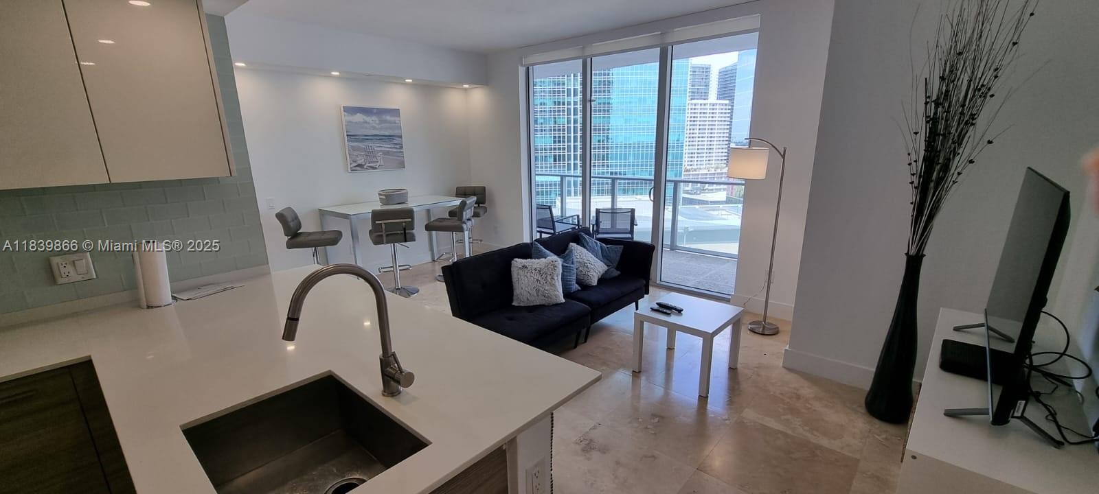 Modern 1 bed/1.5 bath unit on the 17th floor of Brickell House featuring tile flooring, high-impact windows, a European kitchen with premium appliances, granite countertops, and a walk-in closet. Enjoy resort-style amenities including two pools, spa, BBQ area, gym, theater, and kids' playground. Prime location in the financial district.
