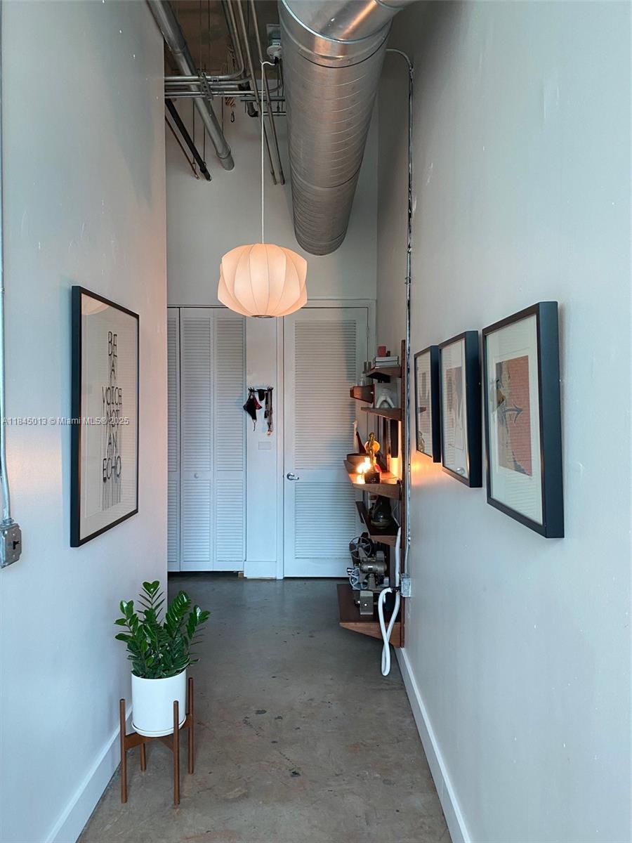 NYC Style Industrial Loft located on the NE Corner tons of natural light soaring 15' ceiling with a sleeping loft. Large open balcony. Large corner kitchen with Italain cabinets, concrete counter tops, stainless steel appliances. The Loft also has a stackable washer and dryer. Parc Lofts in located right between Downtown and Wynwood off North Miami Ave and 17th Street. Minutes to Midtown, Edgewater and Miami Beach. Text LA for easy showings. Won't Last.