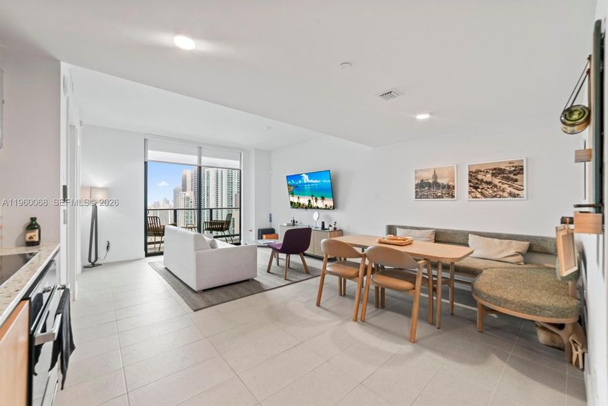 Step into this fully furnished, move-in-ready residence with stunning city and bay views. Ideal as a chic urban home or a high-performing investment, this stylish 1-bed, 1-bath unit is located in a newer building and offers exceptional flexibility. The thoughtfully designed layout features designer décor, custom closets, and impeccable attention to detail—truly turnkey. Enjoy resort-style amenities including a full-service spa, pool, kids’ play area, three on-site restaurants, meeting rooms, and more. Unbeatable location directly across from Kaseya Center and just steps from Miami Worldcenter, Bayside Marketplace, and the waterfront—live or invest at the center of it all.