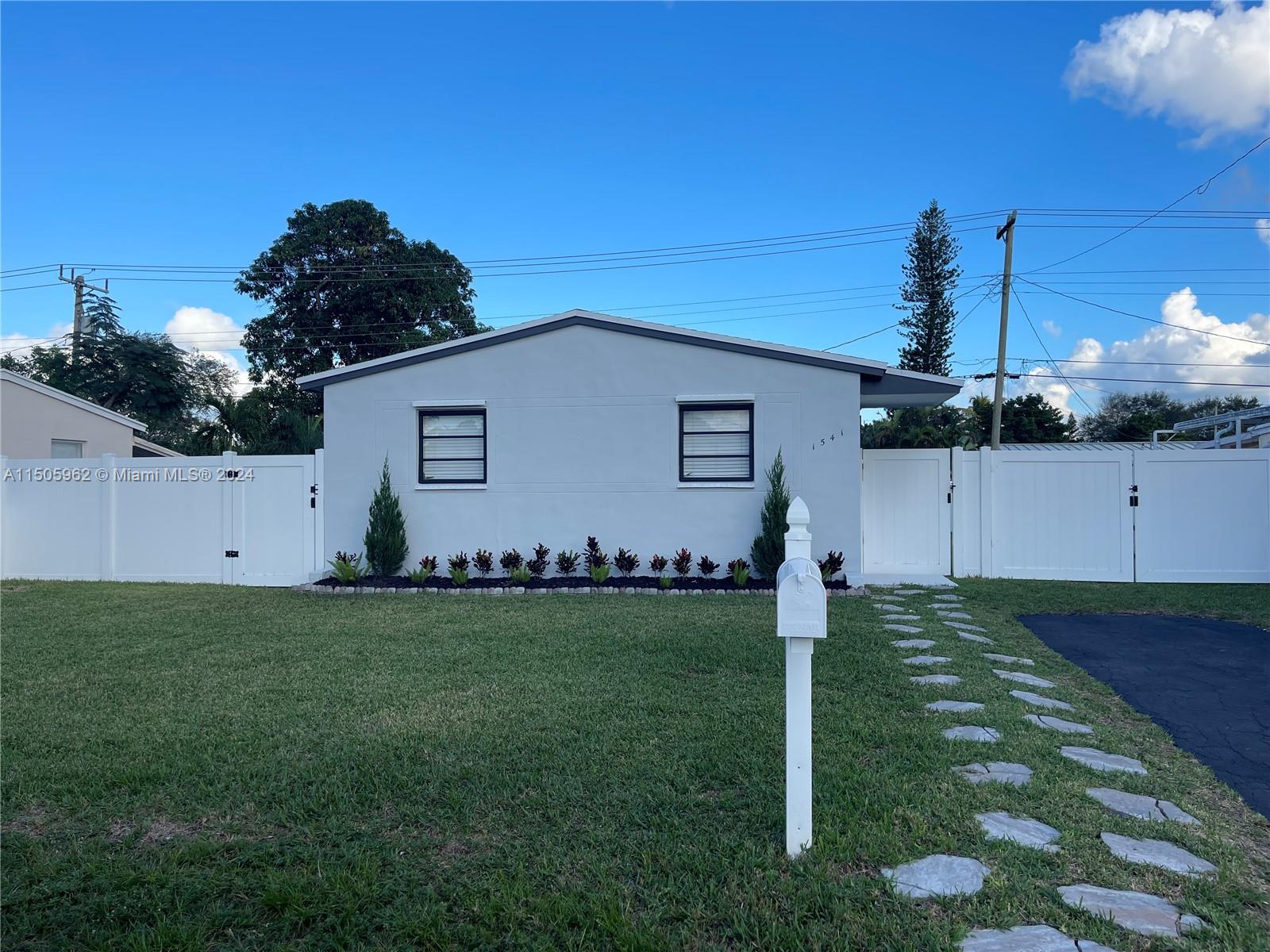 Welcome to this stunning move in ready and fully renovated single-family home in Hollywood, Florida. This residence boasts a complete remodel, featuring a new roof, upgraded floors, and brand new stainless steel appliances. Enjoy the expansive and inviting white fenced backyard, perfect for entertaining. A standout feature is the absence of association approvals, providing hassle-free fast approval and move in process. The location in Hollywood, Florida, adds to the appeal, considering the city's attractions, proximity to beaches, restaurants and vibrant lifestyle. Bring your fussiest clients, they will love to live in this beautiful home!