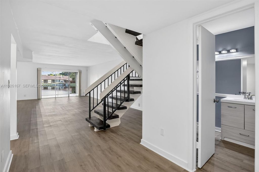 Photo of 9703 N New River Canal Rd #103, Plantation, FL 33324 (MLS # A11926167)