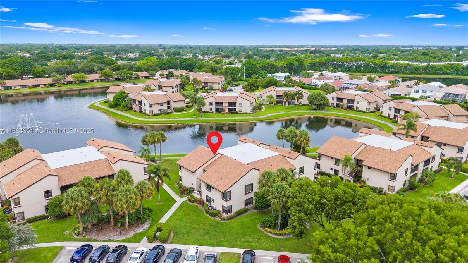 Welcome Home! Gorgeous 2-bedrooms, 2-bathrooms 1st floor condo unit in the highly desirable community of Boca Glades in Boca Raton offering resort-style living! The opened Florida Room adds valuable extra living space, perfect for entertaining. Enjoy breath-taking & spectacular views of the lake with gorgeous sunsets from the comfort of your home, year round. The lovely kitchen features a new range hood, new dishwasher & newer disposal. This beautiful condo offers a split bedroom floor plan creating a spacious feel. Recent upgrades include a newer roof. Boca Glades offers amenities such as: clubhouse, 2 pools, tennis courts, fitness room and so much more! In a prime location, minutes from the Turnpike, major Universities, the new Uptown Boca, restaurants and so much more. It will not last!