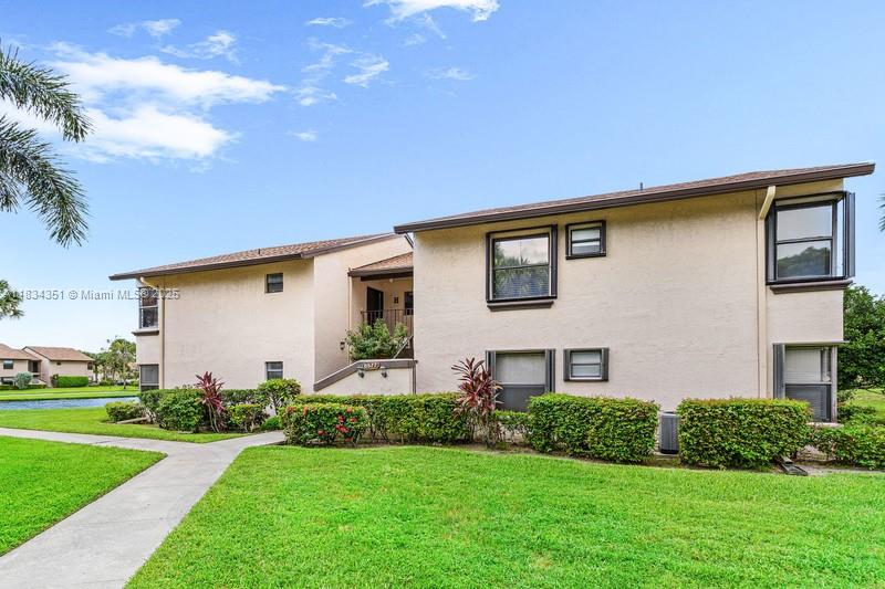 PRICE REDUCED! Gorgeous 2-bedrooms, 2-bathrooms 1st flr. condo unit in the highly desirable community of Boca Glades in Boca Raton offering resort-style living! The opened Sun Room adds valuable extra living space, perfect for entertaining. Enjoy breath-taking & spectacular views of the lake with gorgeous sunsets from the comfort of your home, year round. The lovely kitchen features a new range hood, new dishwasher & newer disposal. This beautiful condo offers a split bedroom floor plan creating a spacious feel. Recent upgrades include a newer roof. Boca Glades offers amenities such as: clubhouse, 2 pools, tennis courts, fitness room and so much more! In a prime location, minutes from the Turnpike, major Universities, the new Uptown Boca, restaurants and so much more. It will not last!