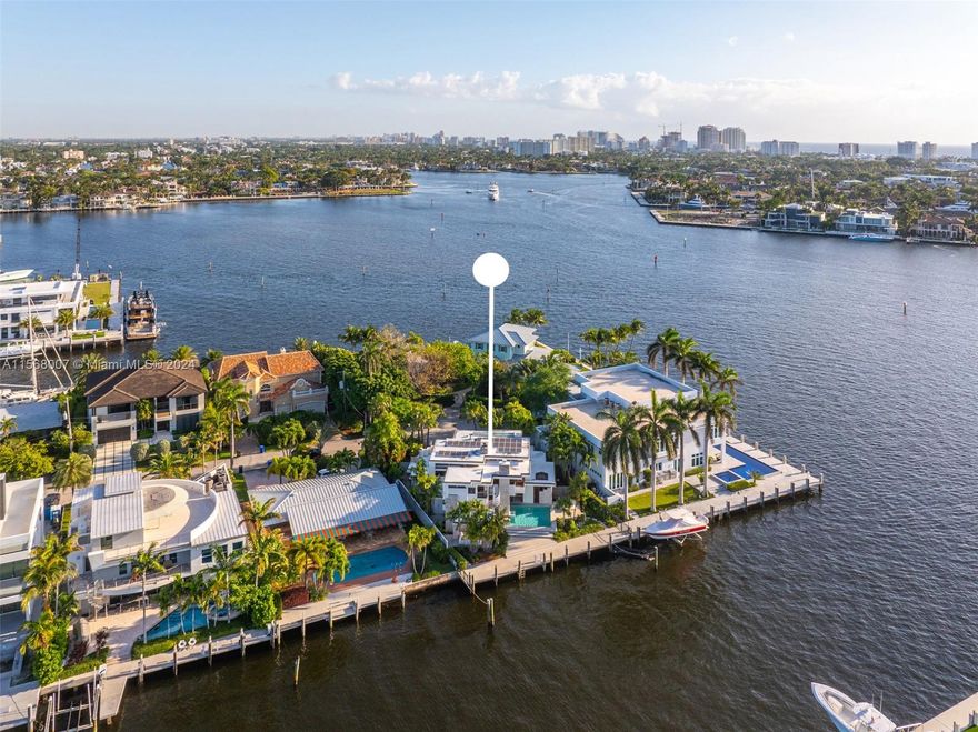 Impeccably located within Fort Lauderdale’s famous waterfront neighborhood, Lauderdale Harbors. Minutes away from Las Olas, yet secluded enough to enjoy the privacy of your own coastal paradise. 75 feet of unobstructed water-frontage, this property is a haven for boating enthusiasts who enjoy easy access to the ocean with no fixed bridges to navigate. The position of the property allows natural sunlight to dance across the home throughout the day; and the southern pool exposure grants views that pour across the open river. The bouquet of windows will have you enjoying the lavish tropical lifestyle from dawn 'til dusk. Step inside the mahogany doors and you'll find 5 bedrooms, 3.5 bathrooms, an office, and a yoga room. Ready to move in, or customize to your own taste.