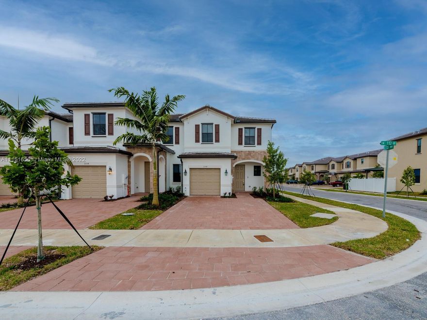 Beautiful BRAND NEW CORNER TOWN HOUSE with GARAGE in AquaBella a masterplan community in Hialeah, FL, that offers a convenient location and a LOT of amenities. The community has an ideal location near Miami Lakes withexcellent schools, shopping and restaurants within minutes, as well as easy access to Turnpike and US Route 27. Homeowners can also enjoy a wide variety of community amenities, such as a private lake and a deluxe clubhouse with a swimming pool, gym and kids room. Great room and kitchen share a convenient and contemporary open floor plan on the first level of this two-story townhome, while a patio offers space for
indoor-outdoor living. Three bedrooms are situated on the second floor, including the luxe owner’s suite. 
Easy to show!