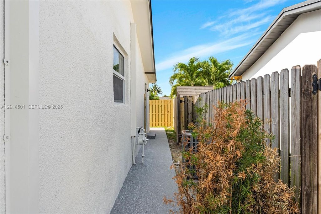 Photo of 9720 NW 24th Pl #B, Sunrise, FL 33322 (MLS # A12014501)