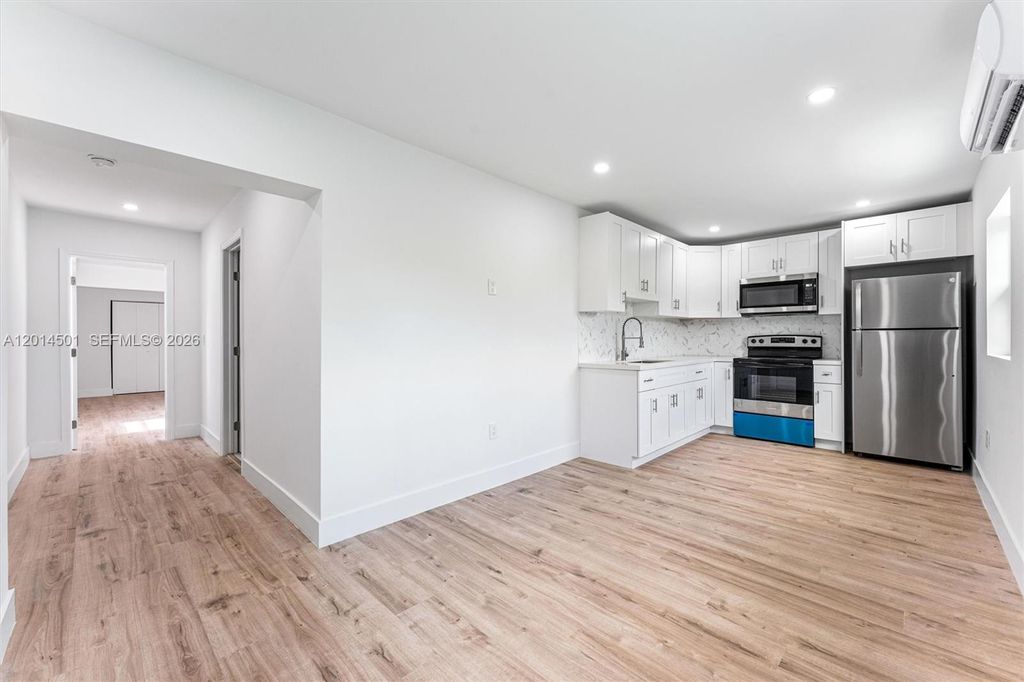 Photo of 9720 NW 24th Pl #B, Sunrise, FL 33322 (MLS # A12014501)