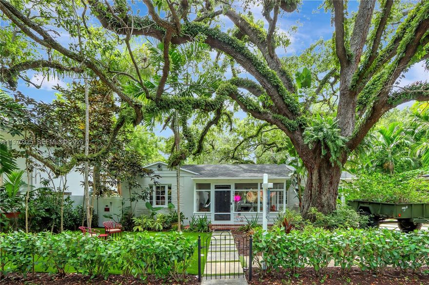 Set within the storybook charm of Miami’s historic Spring Garden neighborhood, this beautifully renovated 4-bedroom, 3-bath residence offers an exceptional lifestyle defined by privacy, character, and effortless convenience—crafted for those who believe only the best will do. Light-filled interiors showcase thoughtful updates throughout, including a contemporary kitchen, impact windows, and a welcoming fireplace that creates a warm, refined ambiance. A detached guest house adds valuable flexibility, perfect for extended stays, a home office, or a creative retreat.
Outdoors, the generous 9,450-square-foot lot feels like a private sanctuary, complete with a spacious entertaining deck, hot tub, and lush greenery that enhance the home’s tranquil setting. Spring Garden is celebrated for its historic significance, majestic tree canopy, and strong sense of community. Opportunities to own a fully updated home in this timeless and centrally located neighborhood are truly rare.