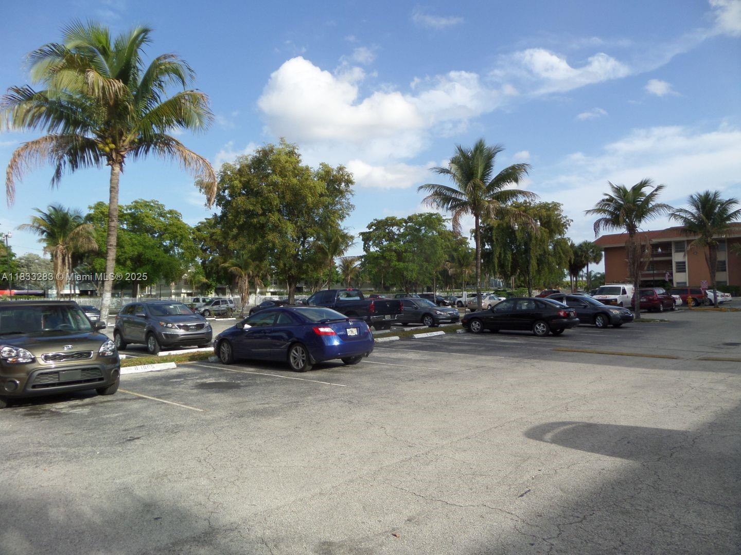Discover this charming 1-bedroom, 1-bathroom condo located in a secure gated community in the desirable Country Club area of Hialeah. This affordable gem features a private balcony and convenient on-site laundry facilities. Enjoy resort-style amenities including a pool, clubhouse, BBQ area, and lush walking trails. The unit is currently rented for $1,600 on a month to month basis. Schedule your showing today!