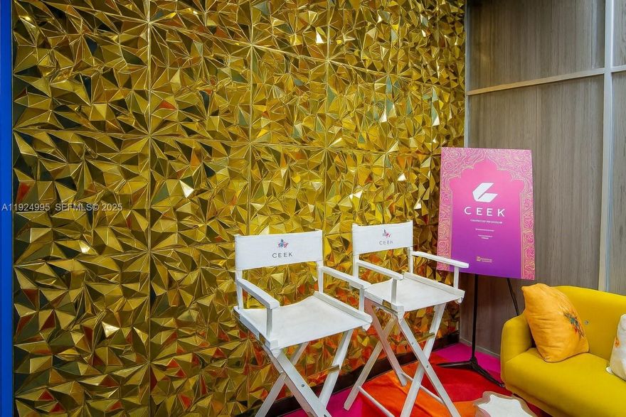 Turnkey podcast and media production studio located in Riviera Point Business Center in Doral. This 964 sq. ft. office condo features a complete professional buildout with two video walls, four studio speakers, along with additional production equipment and inventory included in the sale. The interior offers a reception area, open production space, and three enclosed rooms suitable for editing, recording, or office use. The unit has upgraded lighting, modern finishes, and a flexible layout to accommodate various media or business uses. Convenient location near major highways, shops, and services, with ample parking and professional building amenities. A ready-to-use space ideal for content creation, media services, or businesses seeking a fully equipped creative workspace.