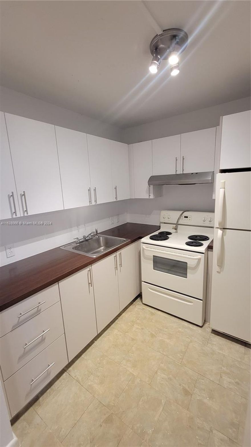 BEAUTIFUL  APARTMENT.  Most desirable 1 bed and 1.5 bath 2nd floor unit with Central AC. Century Village is a 55+ community with many activities, entertainment and amenities, walking and biking paths, billiards, tennis courts, pickleball courts, bocce, and shuffleboard. The open-concept floor plan offers a variety of design options and a light, bright space.Updated wood laminate flooring throughout and upgraded fixtures and finishes. LEASE IS OK RIGHT AWAY.SELLER MOTIVATED