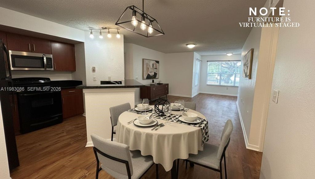 Photo of 12980 Vista Isles Dr #315, Sunrise, FL 33325 (MLS # A11983086)