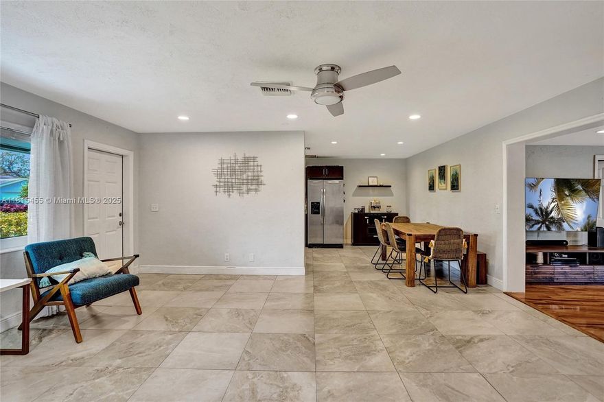 Mid-Century Coastal Charmer in Golf View Harbor! This beautifully maintained 3-bed, 2-bath home offers 1,600 sq ft of open living space with all impact windows, two new impact French doors, and a 2023 AC. The kitchen features stainless steel appliances and flows into a large screened patio. NO HOA—bring your boat, RV, or trailer with zero restrictions! Located minutes from the beach, Downtown Delray, Boynton Beach, Baptist Hospital, and I-95. Enjoy a family-friendly neighborhood with access to Caloosa Park’s trails and athletic fields. A rare find with true freedom and comfort!