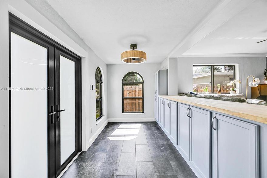 Adorable updated home! Family friendly neighborhood, walkable and safe. Don't miss this incredible opportunity to own a versatile and spacious home in the heart of Hollywood! This beautifully maintained property features 3 bedrooms, 2 bathrooms, and a fully equipped 1/1 mother-in-law suite with a private entrance, full kitchen, and bathroom-ideal for multi-generational living or potential rental income. Granite counters and stainless steel appliances in main house. Shingle gray roof installed 2020, 30 solar panels installed 2017, New Central A/C 2022, Impact Windows with Tint installed 2022 and 2025. Bathrooms updated 2025. Large backyard with plenty of room for a pool. Located 5 miles from beach, 1 mile from the Yellow/Green Farmers mkt. 2 miles from Dania Pointe shopping and dining.