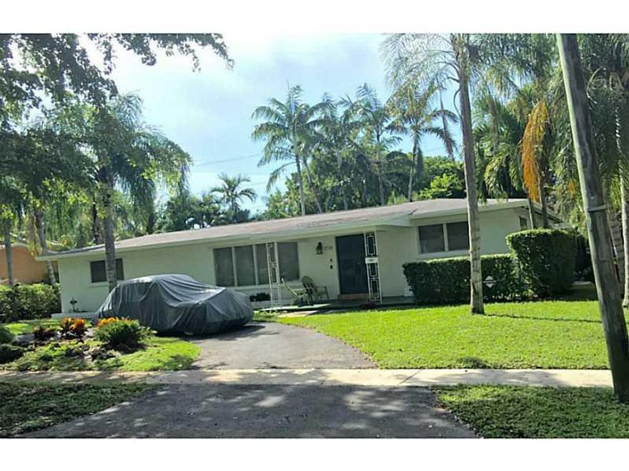 Charming 4 bedroom 2 bathroom pool home in the sought after area of Stanley Manor.  Enjoy beautiful views of  the pool area from all rooms. Located on a quiet, gorgeous tree lined street in walking distance to Enchanted Forest Elaine Gordon Park. NOT SUBJ ECT TO APPRAISAL.