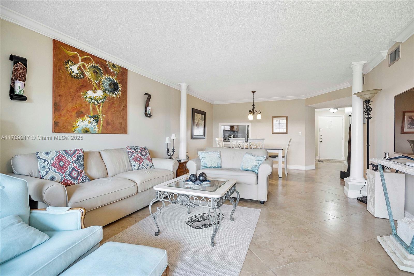 Wow, Lake Views! Amazing 2 Bed/2 Bath Condo Located In Lakes Of Carriage Hills Community. This Home Features Lots Of Space And Natural Light. 2019 Waterheater, Primary Bed With A Large Walk-in Closet, Ceiling Fan, Beautiful Views, Balcony. Spacious Layout With Ceiling Fans In All Rooms, Crown Molding Throughout, Large Dining Room, And A Comfortable Living Area That Flows Into The Eat-in Kitchen. Updated Baths Include A Tub/Shower Combo In The Primary Suite And A Tub In The Secondary Bath. Upgraded Kitchen Boasts SS Appliances, Tons Of Storage, A Breakfast Bar, And A Stylish Glass Tile Backsplash. Large Utility & Laundry Room. Tile And Laminate Floors Throughout. Great Amenities Including Heated Pool, Billiard Room, And More. Don’t Miss Out On This Fantastic Opportunity! Must See!