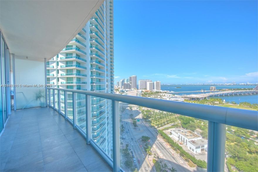 Beautiful 1 Bed/1.5 Bath condo at Marina Blue w/ 845 interior square feet, beautiful with a wooden floor (Brasilian Teak) flooring throughout, walk-in closet w/ built-in cabinets, stainless steel appliances, washer/dryer, spacious balcony, and 9-foot high ceilings with floor-to-ceiling glass windows offering breathtaking views of Biscayne Bay, Museum Park, Miami Beach skyline, and cruise ships. Rent price includes basic cable TV, water, and 1 assigned parking space. Building amenities: two swimming pools (sunset & sunrise), hot tub, fitness center, sand volleyball court, 24-hour concierge, valet parking, business center, and party room.